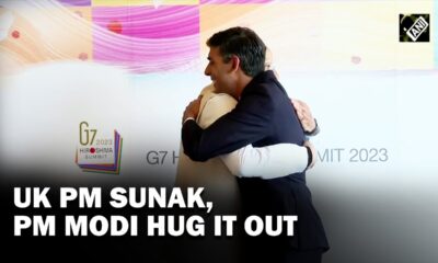 pm modi hugs PM Rishi Sunak