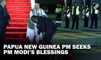 PM Marape touched PM Modi's feet