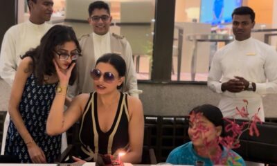 Sushmita Sen cutting cake with her daughters Rene & Alisah
